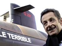 In a speech in front of France's newest nuclear-armed submarine, President Nicolas Sarkozy said that France will reduce its number of airborne nuclear weapons by one third.