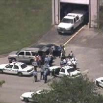 A man has barricaded himself inside a building with a gun inside the Johnson Space Center in Houston.