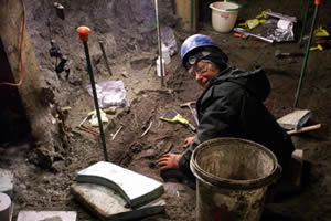 Paleontologist Anne Pasch digs for fossils