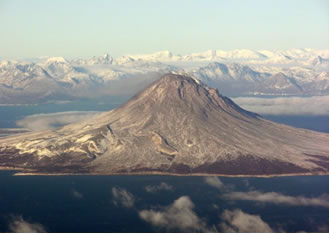 Augustine Volcano - a storybook cone that looms 4,134 feet from Lower Cook Inlet on the horizon near Homer