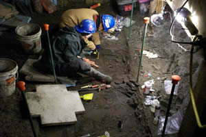 Anne Pasch (left) and Amanda Hansen (right) digging for fossils in the permafrost