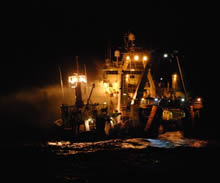 The Coast Guard cutter Alex Haley and some nearby boats helped the crew of a fish processor vessel extinguish a roaring fire Wednesday in the Bering Sea off Alaska's Aleutian Islands.