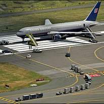 An off-duty United Airlines flight attendant carried a gun on a United Airlines flight from Atlanta and was arrested after landing at Washington Dulles International Airport on Friday, airport officials said.