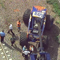 A monster truck giving a demonstration at a local Napa Auto Parts store crashed into a crowd of onlookers at a demonstration in DeKalb, Illinois on Thursday.