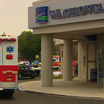 Two guards were killed and a third was wounded in a robbery of an armored vehicle Thursday near a Wachovia Bank branch in Philadelphia, Pennsylvania, police said.
