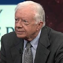 Jimmy Carter said the United States engages in torture that breaches international law and said President Bush creates his own definition of human rights.
