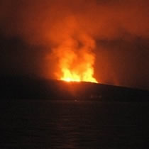 A volcano, spewing lava hundreds of feet into the air, erupted on a island off the coast of Yemen Sunday night.