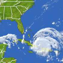 Hurricane Ike, after killing at least 37 people in Haiti, moved over the southern Bahamas Sunday, carrying high winds and heavy rain.
